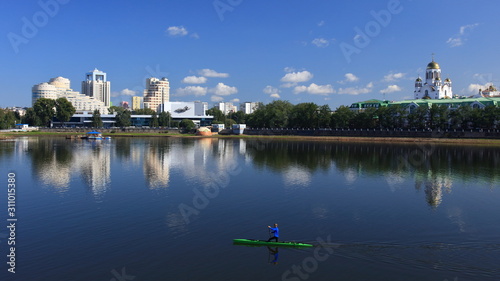 Downtown view of Yekaterinburg. Along with Gorodskoy Prud on Iset river and local cinema in the background. photo