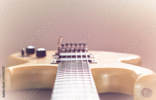 Electric guitar stratocaster sunburst closeup, macro abstract photo