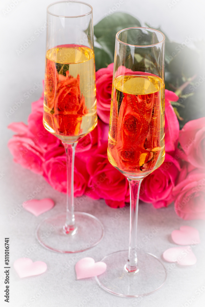 Two Glasses of Champagne and Pink Roses Two Glasses of Champagne and Pink Roses