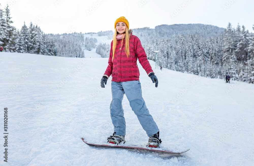 sport girl or woman snowboarder smile alone winter outdoor, female activity