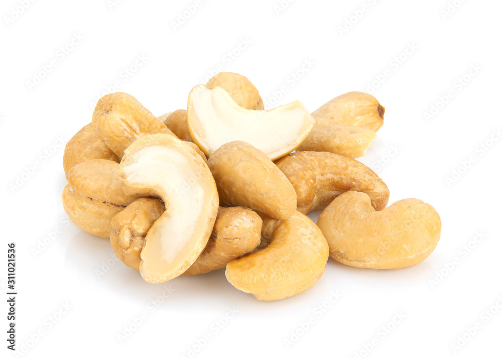 Roasted cashew nuts on white background Roasted cashew nuts on white background