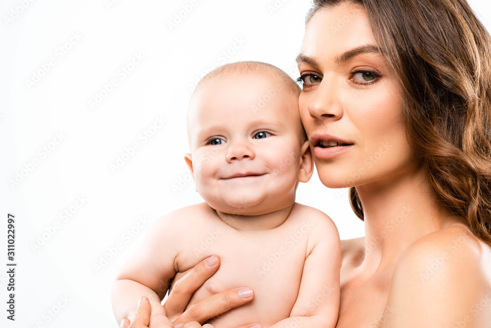 portrait of naked mother holding happy baby, isolated on white portrait of naked mother holding happy baby, isolated on white