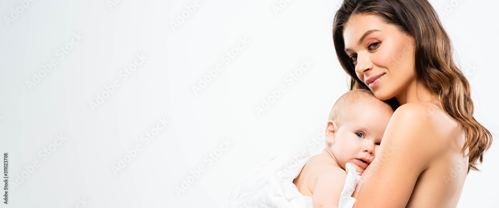 panoramic shot of cheerful naked mother hugging baby, isolated on white panoramic shot of cheerful naked mother hugging baby, isolated on white