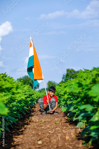 Cute little boy with Indian National Tricolor Flag 