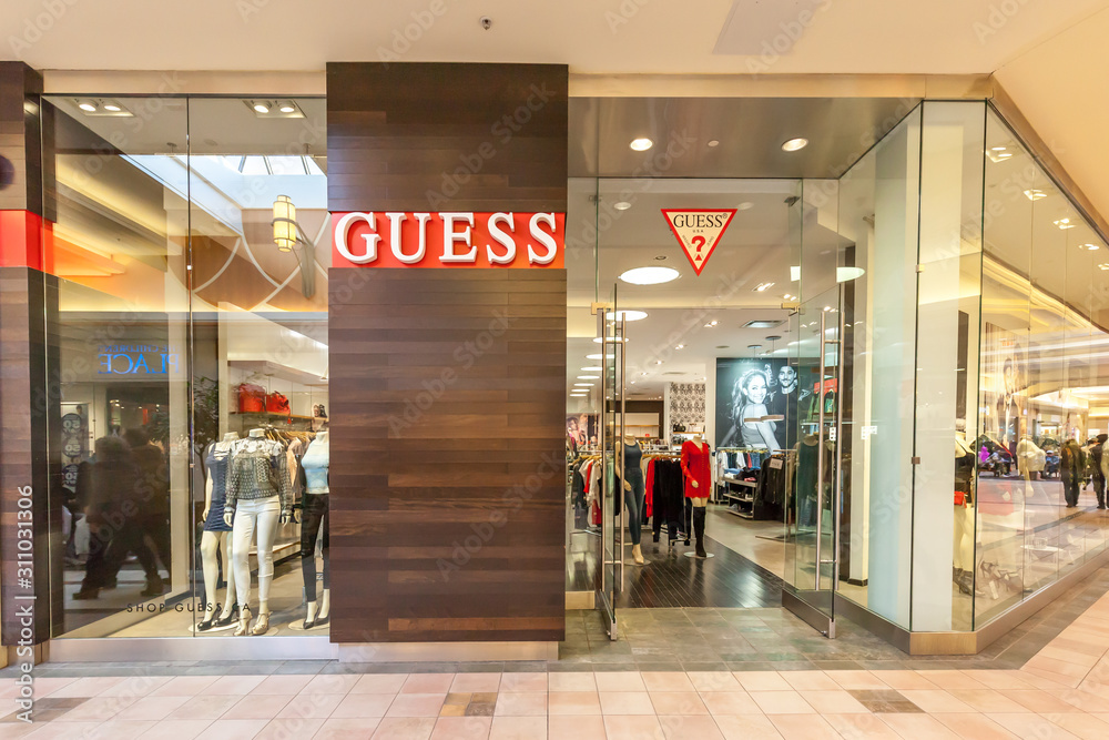 Richmond hill, Ontario, Canada - February 24, 2018: Guess storefront in Hillcrest Mall near Toronto. Guess is an American clothing and retailer. Stock Photo | Adobe Stock