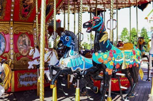 Carousel for children with horses attractions in the Park © dmitriisimakov