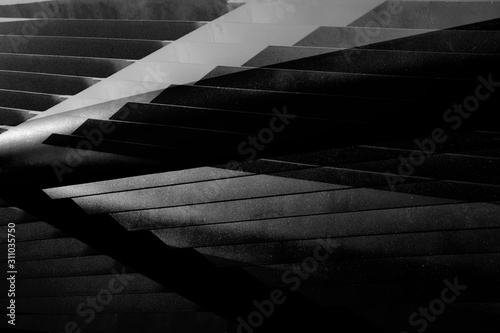 Double exposure photo of metal girders, lath or grid structure. Abstract black and white industrial architecture background with angular structure, polygonal pattern and parallel lines.