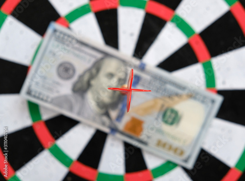 100 usd dollars and dart arrows,