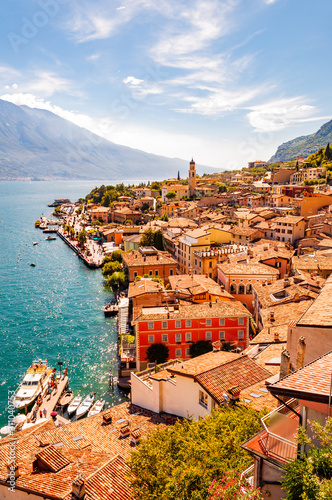 Limone Sul Garda cityscape on the shore of Garda lake surrounded by scenic Northern Italian nature. Amazing Italian cities of Lombardy