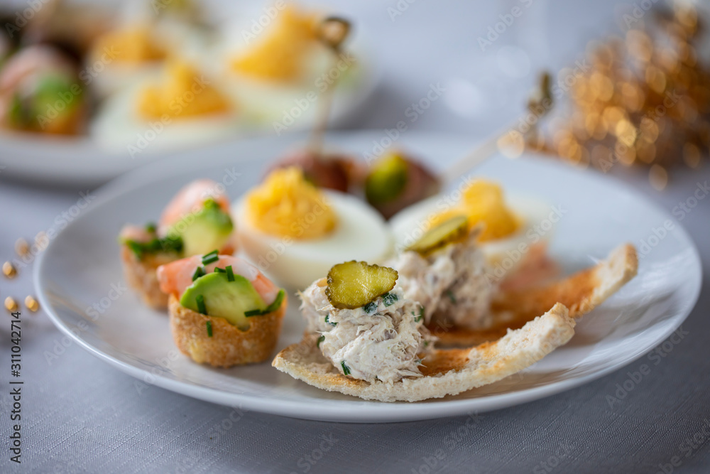 selection of festive canapes, devilled egg , mini prawn coctail, brussels sprout and toast