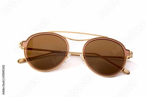Close-Up Of Sunglasses Against White Background
