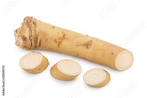 Horseradish root with slices isolated on white background