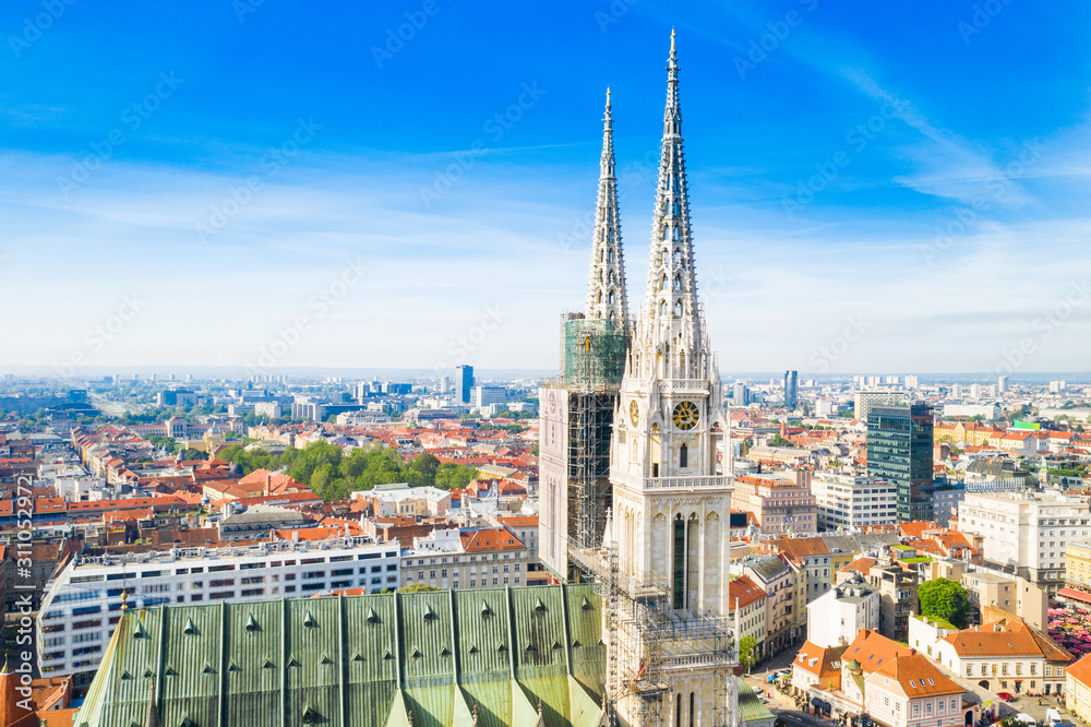 Croatia, capital city of Zagreb, aerial view of city centre and cathedral towers from drone