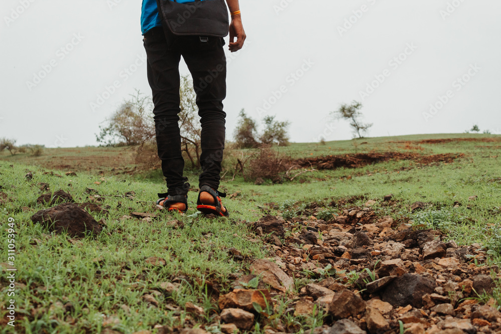 Man walking on the hills Man walking on the hills