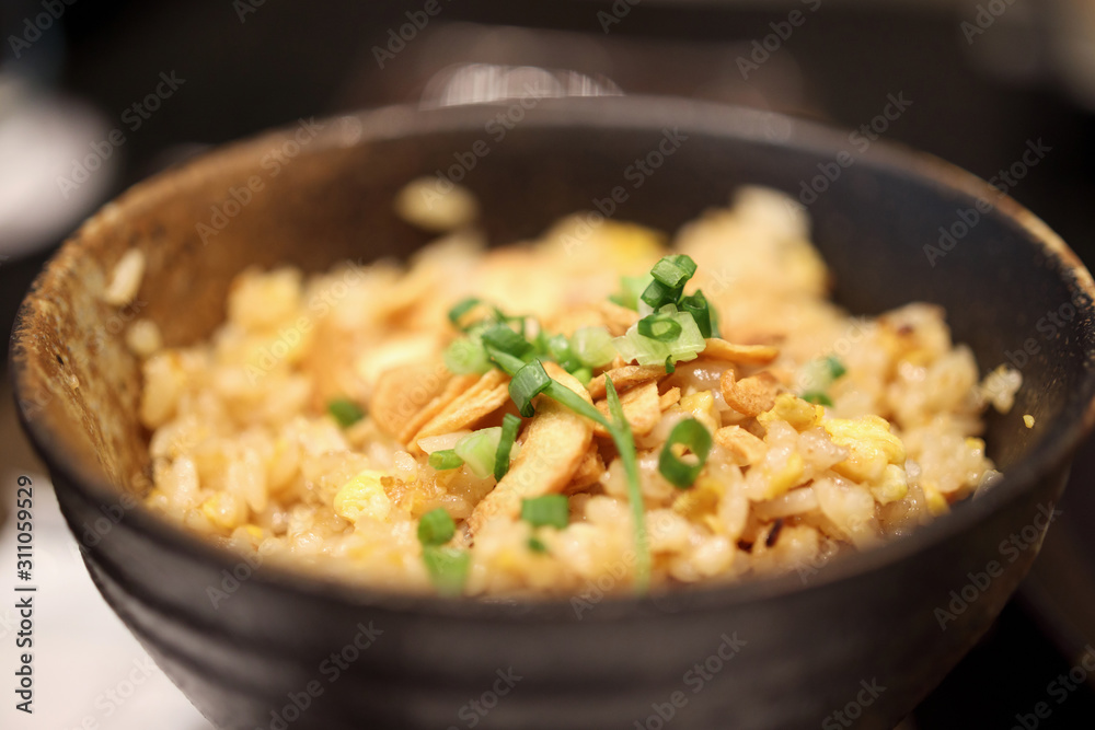 garlic fried rice in bowl close up garlic fried rice in bowl close up