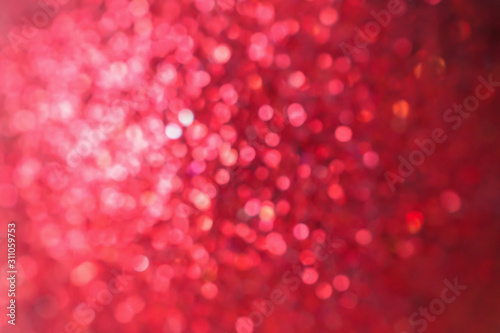 Abstract blur red glitter sparkle defocused bokeh light christmas background