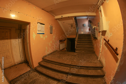 The interior of the shabby old block of flats. Pictured by the fish eye lens. It needs the restoration. 