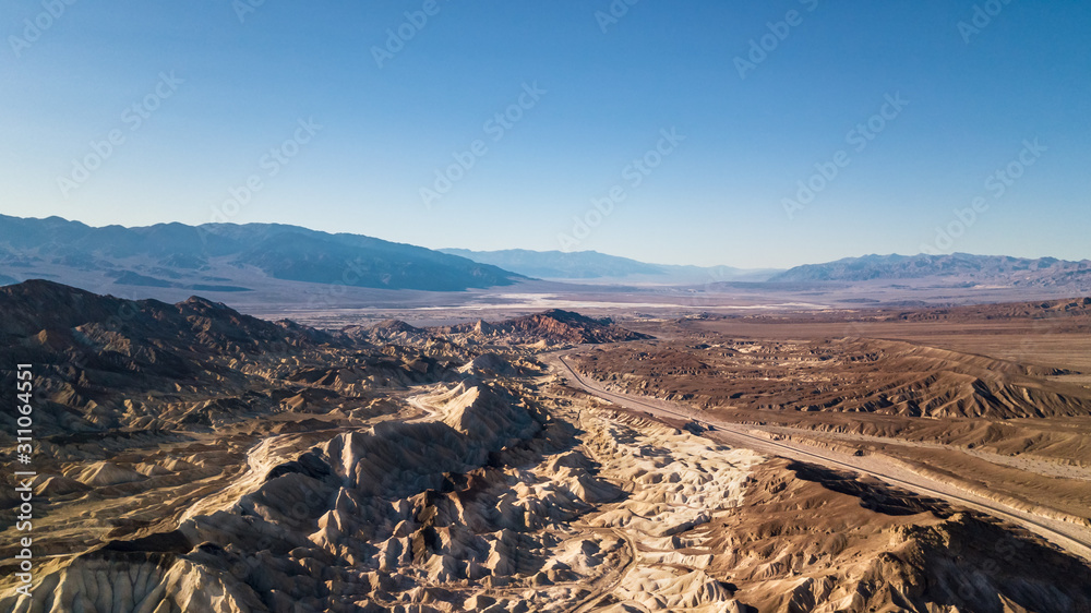 Panoramic drone view over Death Valley as seen from the Zabriskie Point  Stock Photo | Adobe Stock