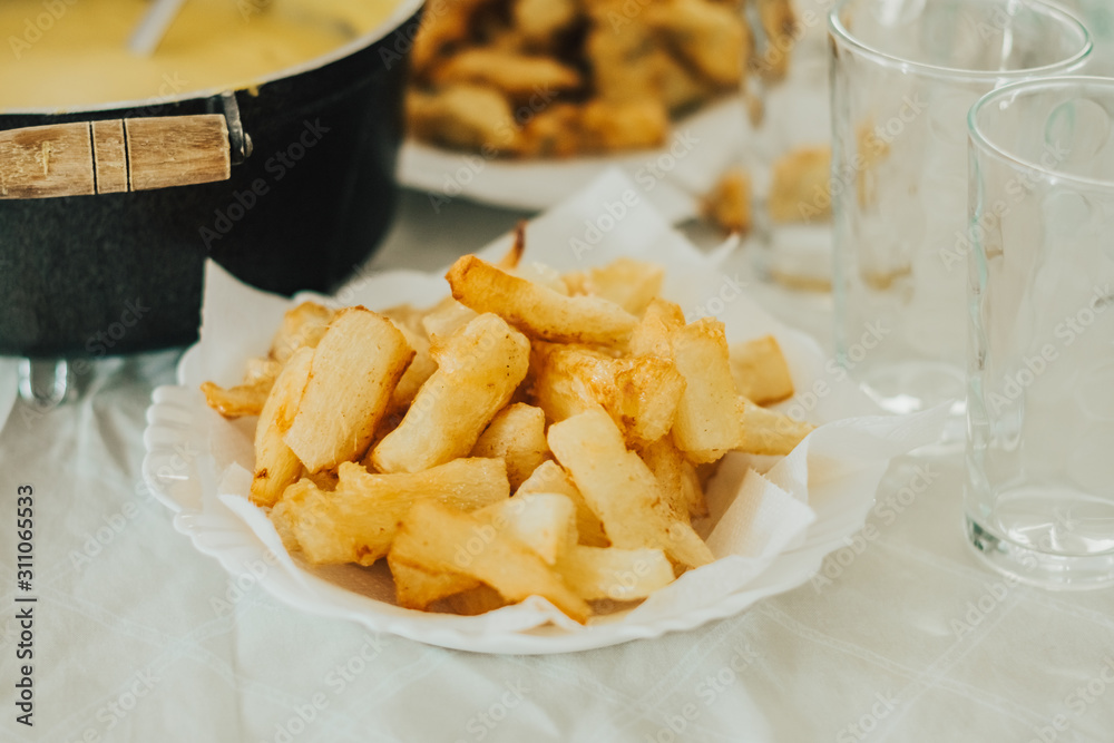 Homemade Brazilian fried cassava on plate Homemade Brazilian fried cassava on plate