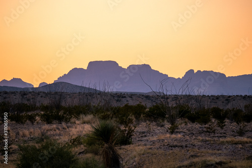 The sun begins to set over the mountains of West Texas. 