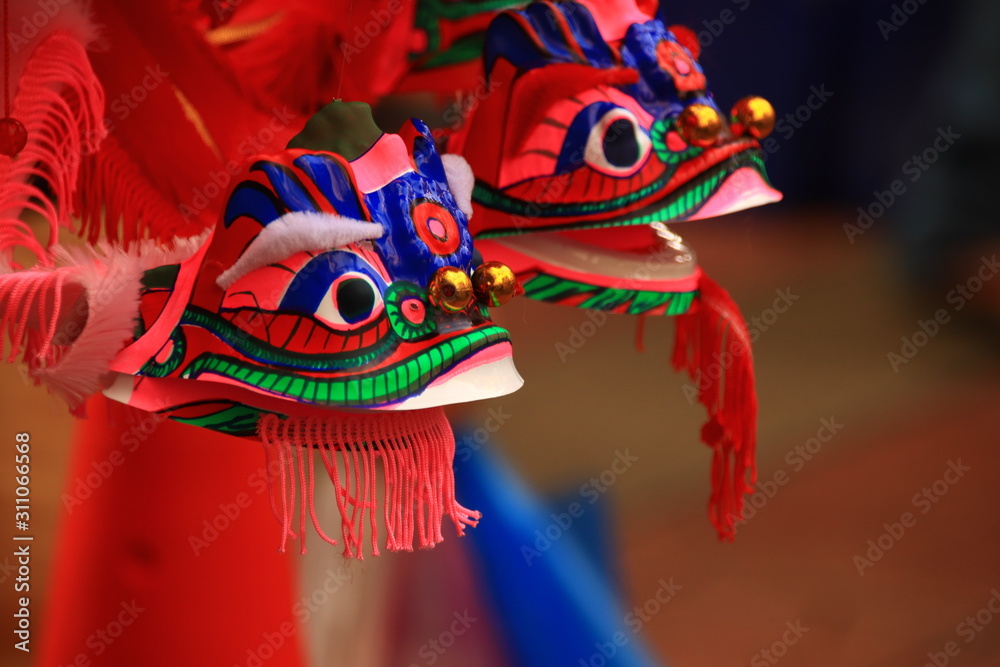 Obraz premium Dragon lanterns and ornaments sold in the street of Yaowarat (Chinatown) in Bankok Thailand in preparation for the Chinese New Year or Lunar New Year
