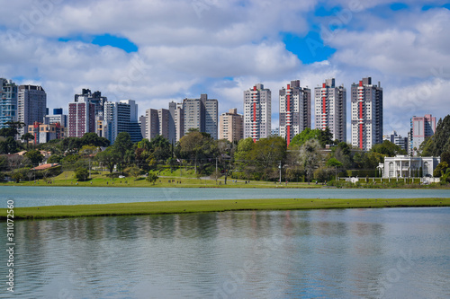 Barigui Park, Curitiba, Brazil. View of several buildings. Lake. photo