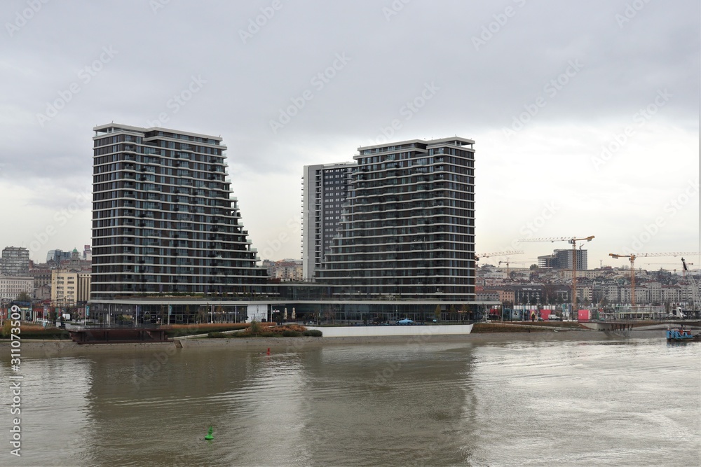 High-rise new buildings on the river bank. High-rise new buildings on the river bank.