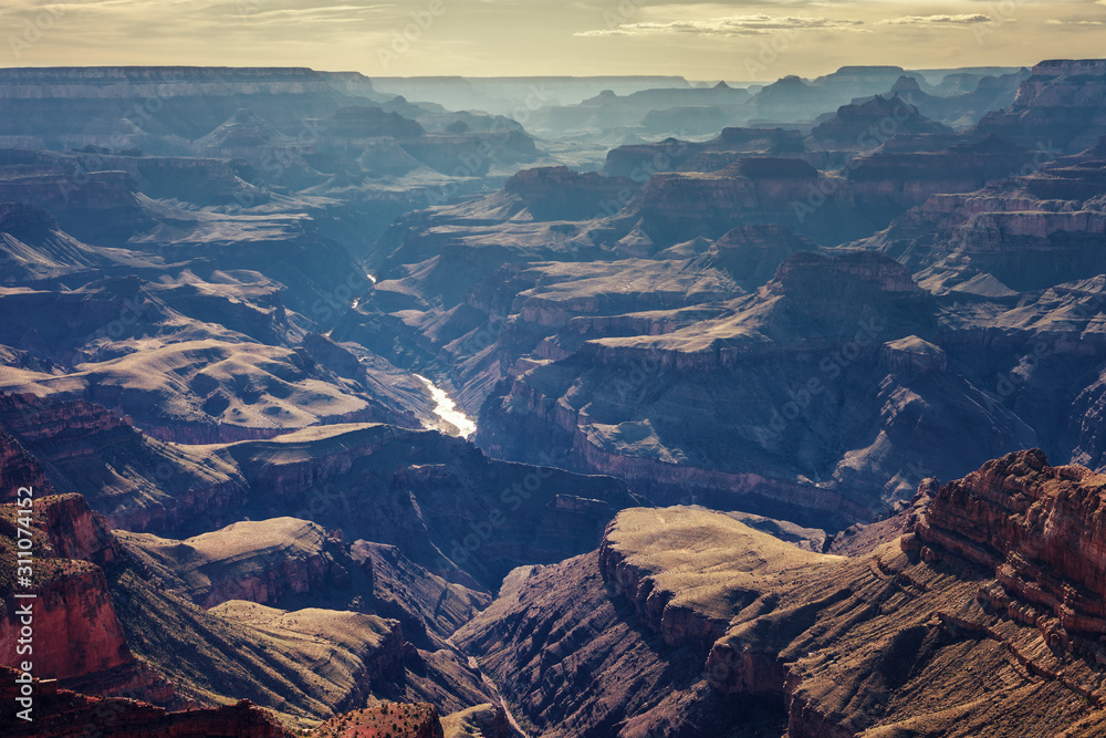 Spectacular landscape of the Grand Canyon, with the Colorado River winding on the background of its beautiful gorges, Arizona