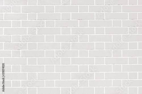 White brick wall, grey background of masonry, texture stained blocks of stonework.