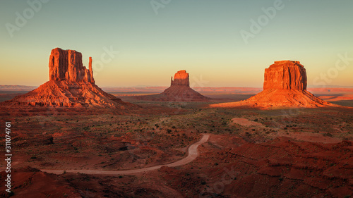 Sunset in the famous Monument Valley, on the border between Arizona and Utah. Navajo tribal park © jarcosa