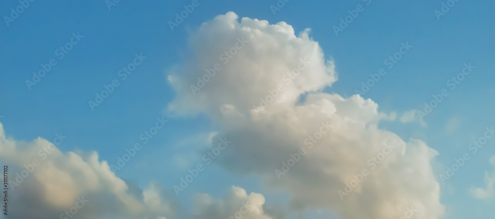 Obraz premium gray Cumulus clouds in a blue sky