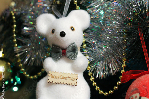 white rat toy on Christmas tree