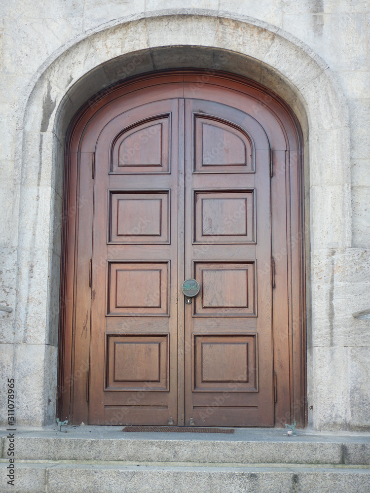 wooden door of an old church