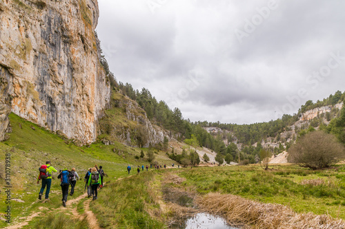 Hikers in a karstic landscape