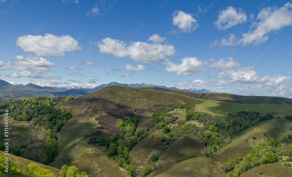 Mountains and blue sky with clouds