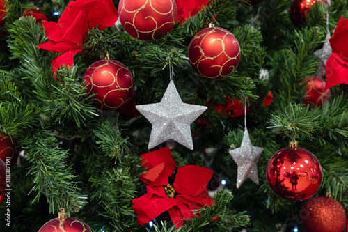 Christmas and new year decorations with lights and Christmas tree in the background. new year concert and background. photo