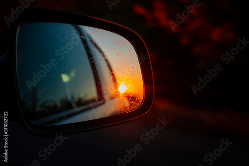 car on road in evening light © Kostick
