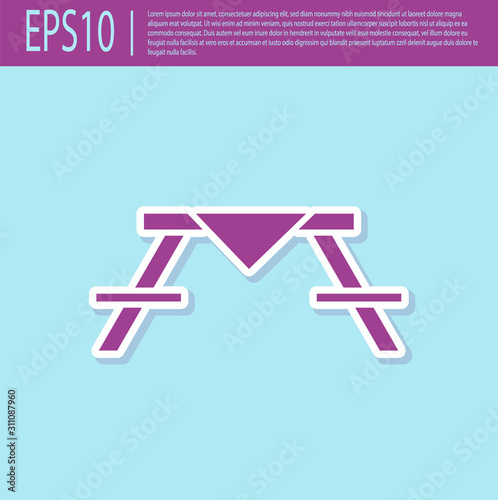 Retro purple Picnic table with benches on either side of the table icon isolated on turquoise background.  Vector Illustration