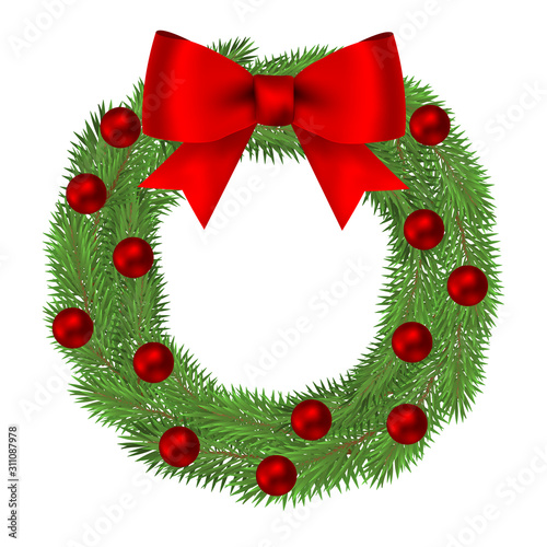 Wreath of Christmas tree branches isolated on a white background.