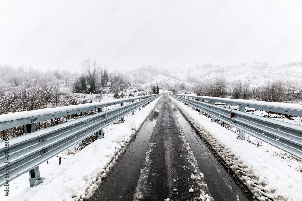 Fototapeta premium River with snow during winter