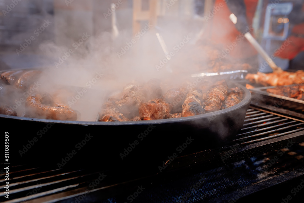 traditional meat in smoke in Christmas market in Wroclaw, Poland traditional meat in smoke in Christmas market in Wroclaw, Poland
