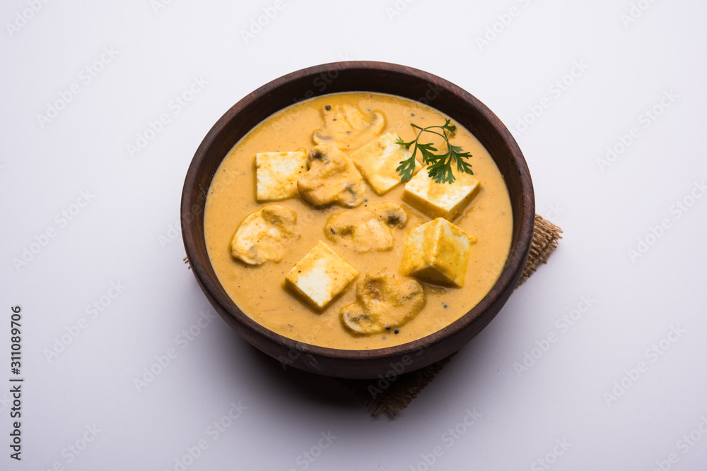 Mushroom Paneer curry or sabzi, served in a bowl. selective focus Mushroom Paneer curry or sabzi, served in a bowl. selective focus
