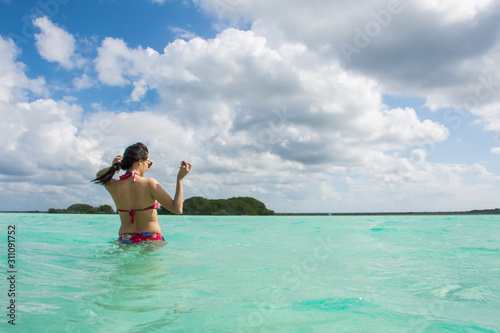 Young woman in beautiful beach 