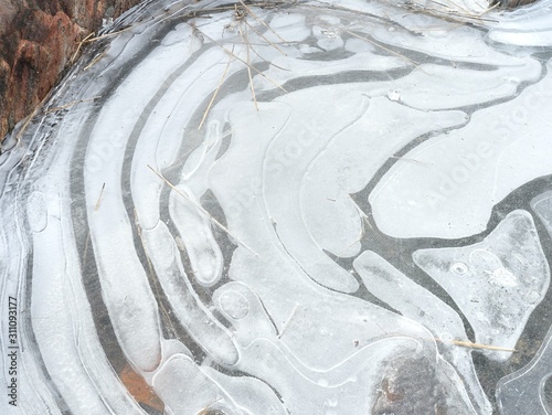Beautiful ice in winter on the ground