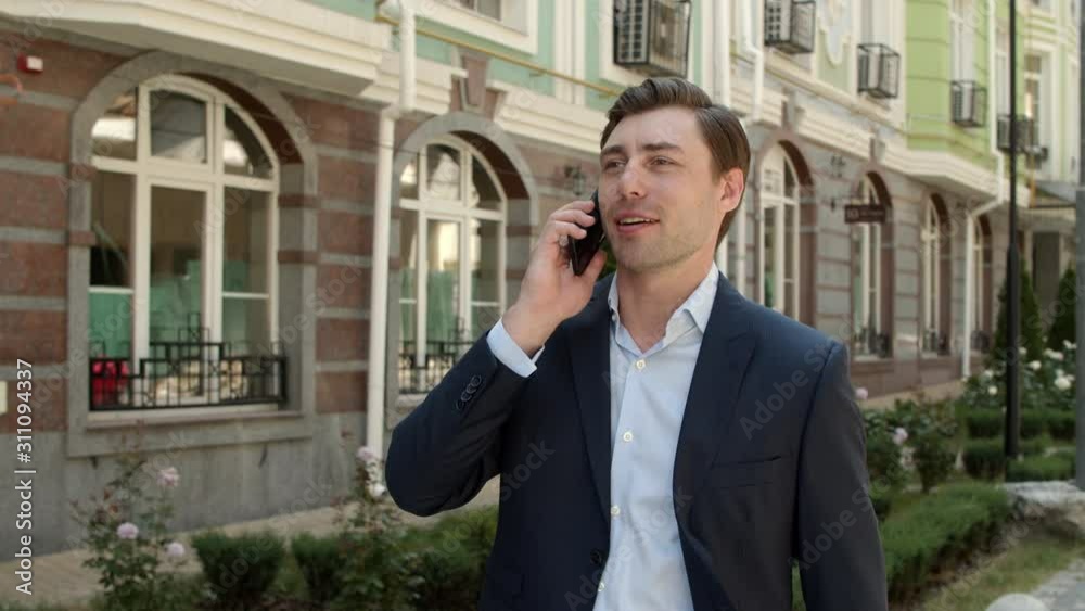 Portrait man having mobile conversation. Man talking phone about business Portrait man having mobile conversation. Man talking phone about business