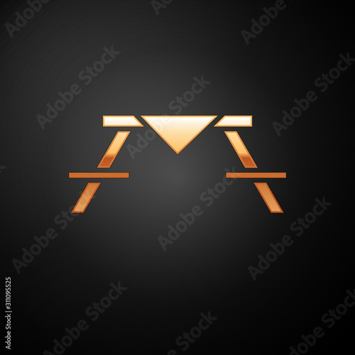 Gold Picnic table with benches on either side of the table icon isolated on black background.  Vector Illustration