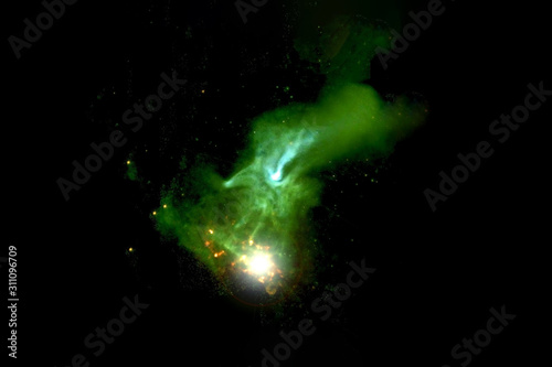Beautiful green nebula with stars. Background texture. Elements of this image were furnished by NASA.