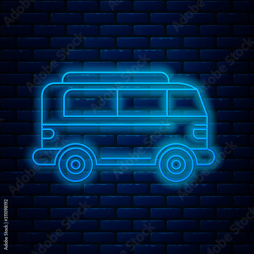 Glowing neon line Retro minivan icon isolated on brick wall background. Old retro classic traveling van. Vector Illustration