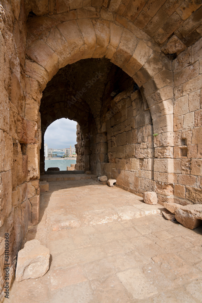 Inner yard and arch of old castle in Saida, Lebanon, was build in XIII century by crusaders