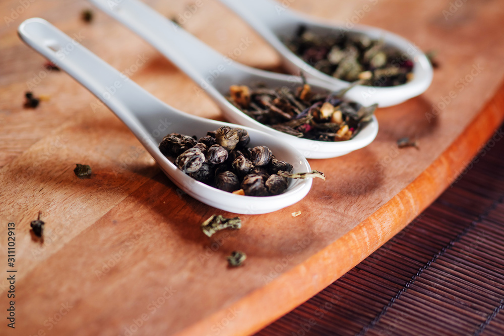 Still life with different varieties of tea, dry tea leaf. making of tasty and healthy hot drink. Still life with different varieties of tea, dry tea leaf. making of tasty and healthy hot drink.